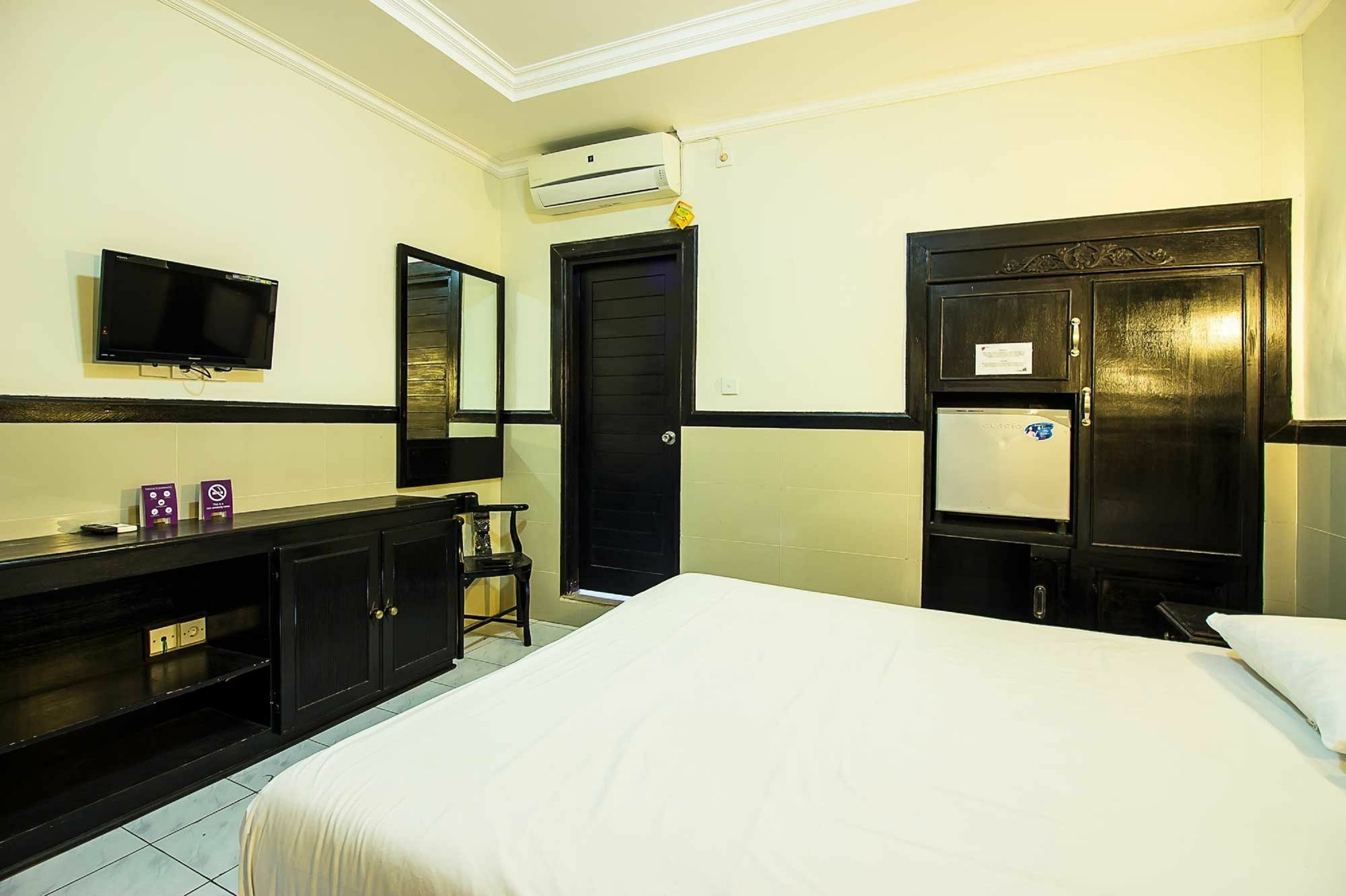 สกาย โฮเต็ล ซันจายา Hotel กูตา ภายนอก รูปภาพ